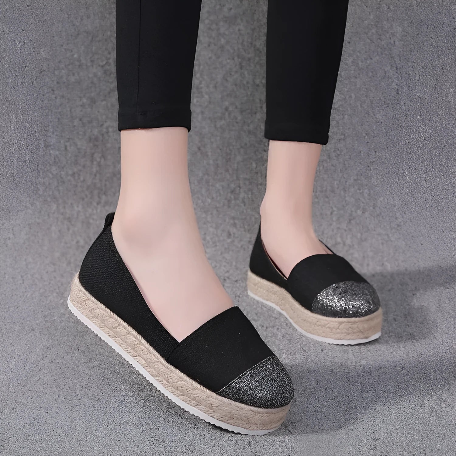 Plus size canvas flats in breathable cloth with round toe design and slip-on construction