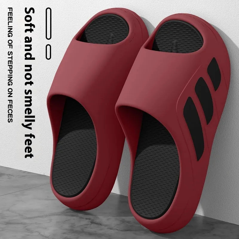 EVA platform slippers in brown, black, red and black, or white and black colours with letter design elements