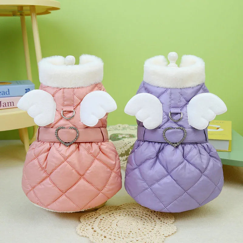 Small dog wearing pink cotton-thickened polyester skirt with cute angel design