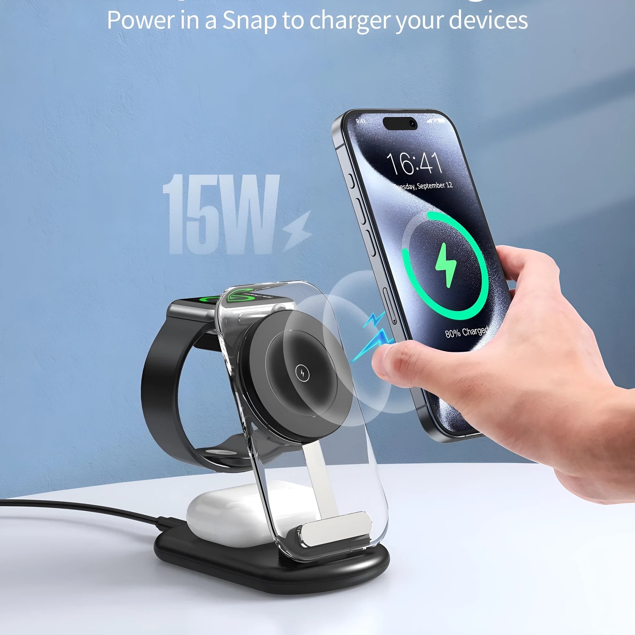 Transparent foldable magnetic wireless charger showing internal coils, unfolded on a table next to a smartphone.