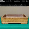 Straight-sided shallow rectangular Yixing purple Zisha clay flowerpot on a wooden surface.