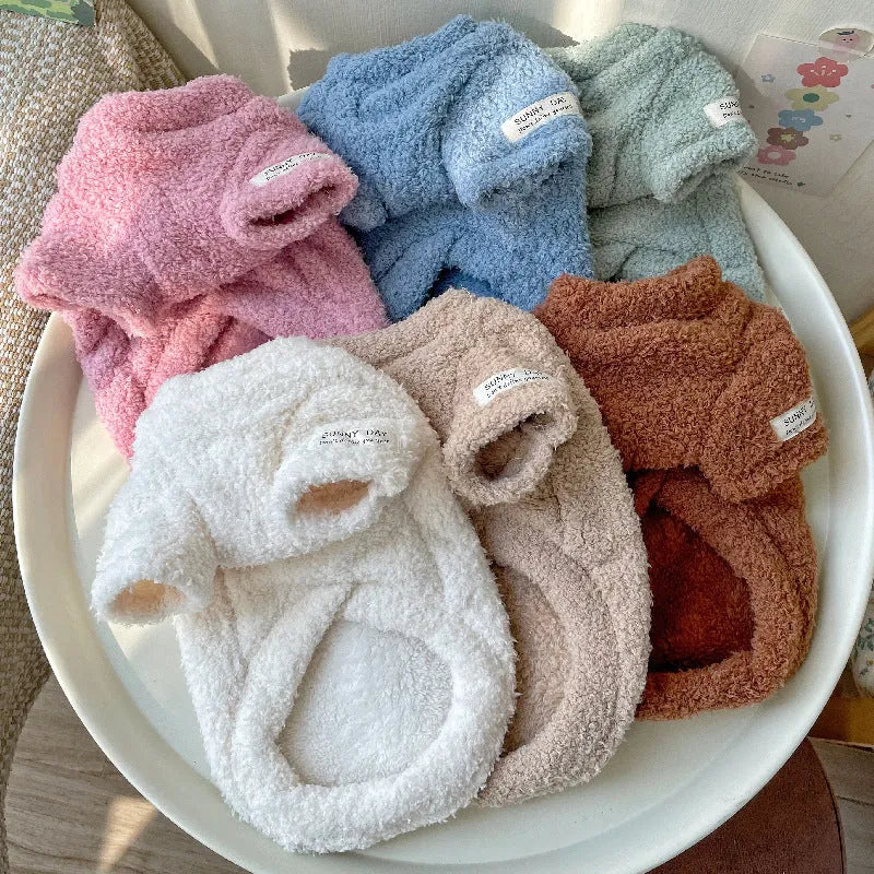 Double-sided cloud velvet pet clothes for small dogs or cats in various colours and sizes.
