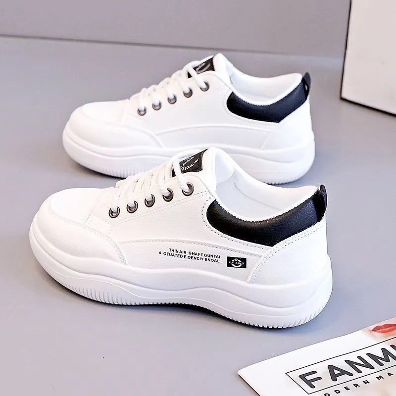 Women's white Korean-style leather shoes with cross straps and lace-up front