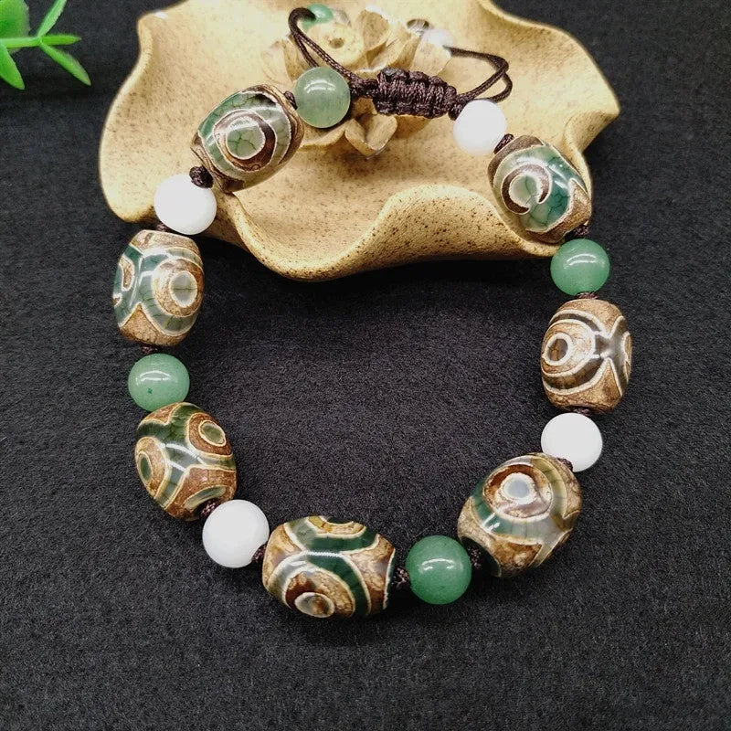 Green agate ethnic bracelet with hand-woven Tibetan beads on black stretch cord