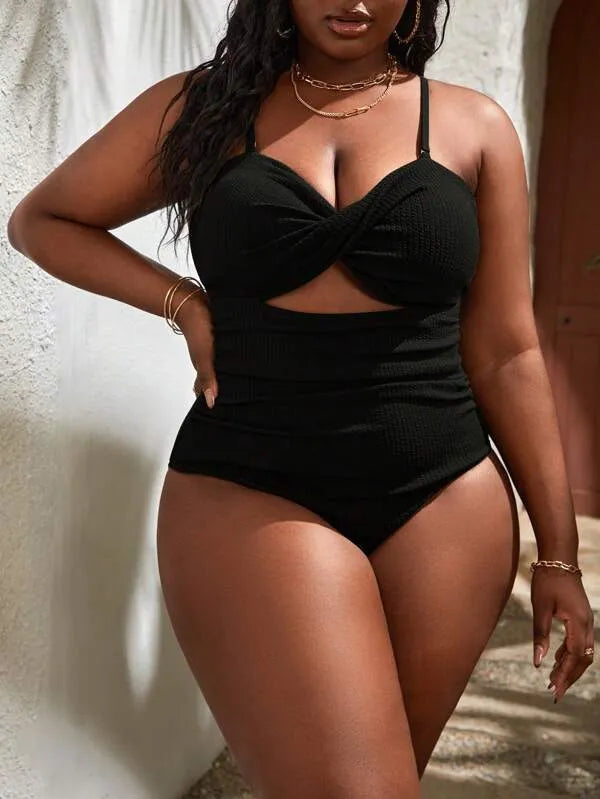Plus size women's black sling triangle one-piece swimsuit with polyester and spandex stretch fabric