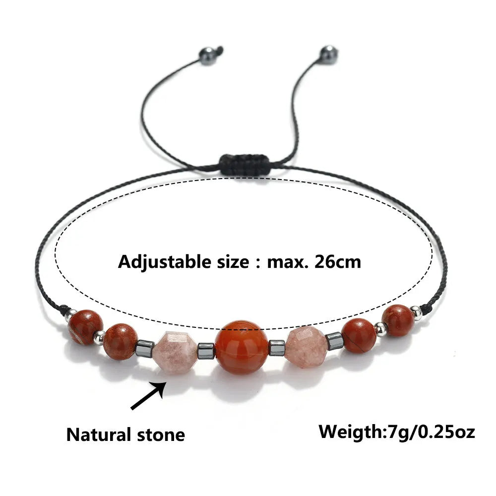 Handmade red geometric bracelet with sunstone, redstone, and copper beads.