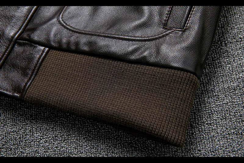 Pure first layer cowhide leather flight suit in black with slim fit, zipper front, and ribbed hem