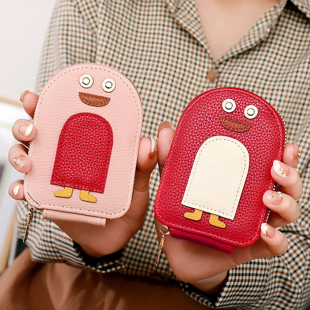 Lychee pattern penguin expanding card holder in black PU leather with rivet details 12x7.5x3cm