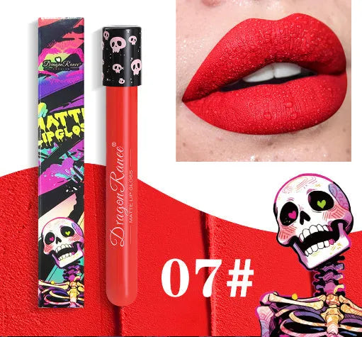 Halloween matte lip gloss in a test tube skull container showing gold and silver shades