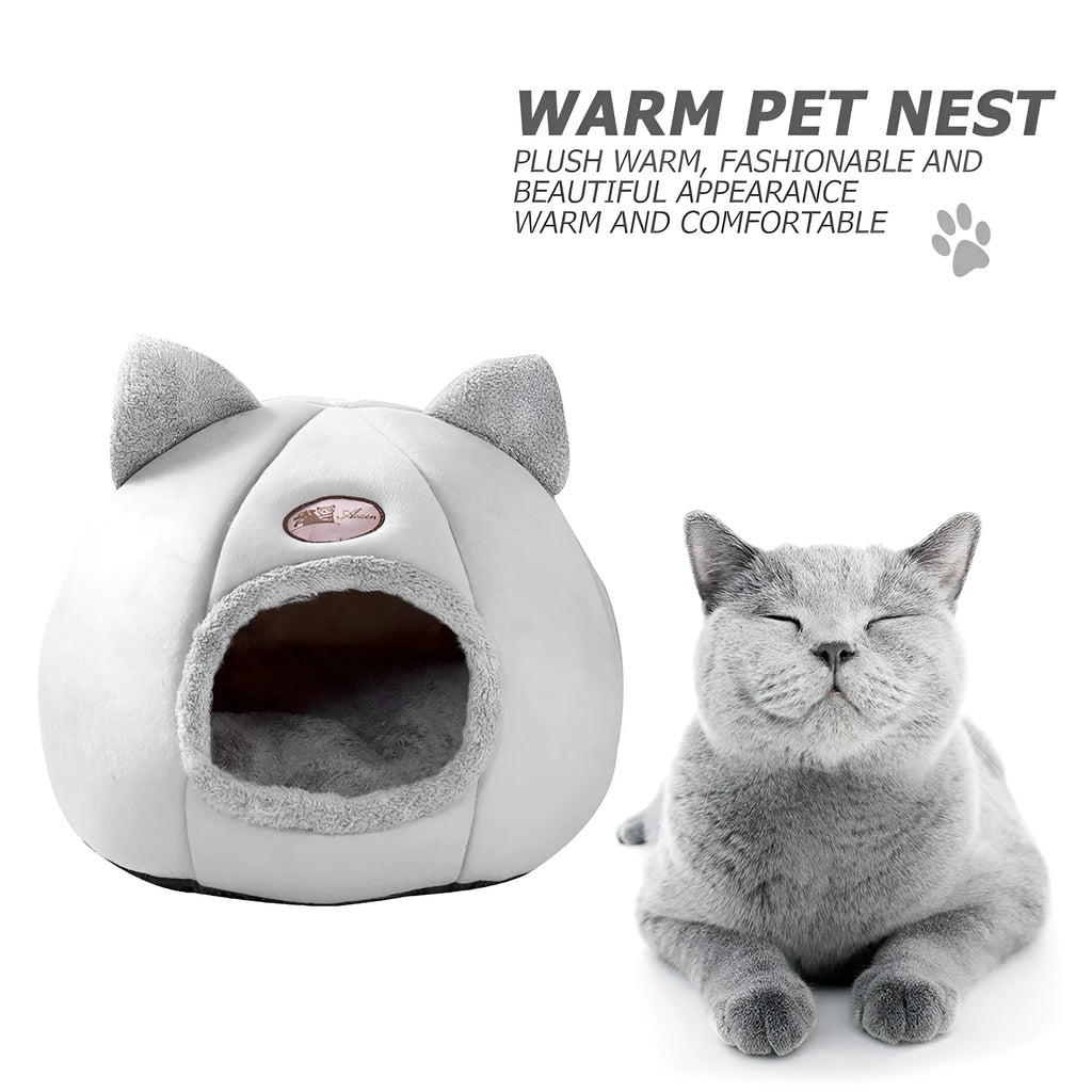 Grey enclosed cat sofa bed with a round entrance hole, showing a soft plush interior and removable cushion.