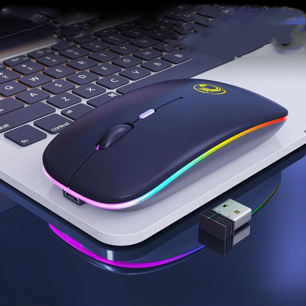 White rechargeable dual-mode silent wireless mouse with blue scroll wheel light on a wooden desk