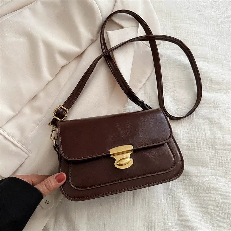 Retro square handbag in soft PU leather with horizontal suitcase shape design