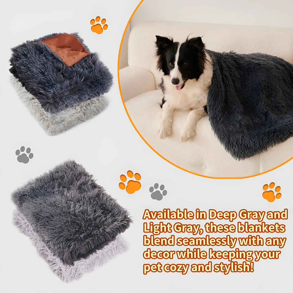 Grey velvet and plush pet blanket laid on a sofa, showing its soft texture and size.