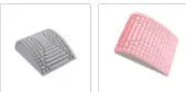 Blue back stretcher pillow for lumbar and neck support on a grey background.