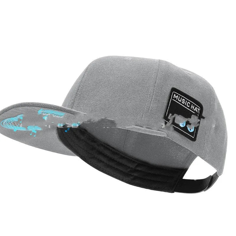 Wireless Bluetooth audio cap headphones in black with integrated side controls and fabric baseball cap design