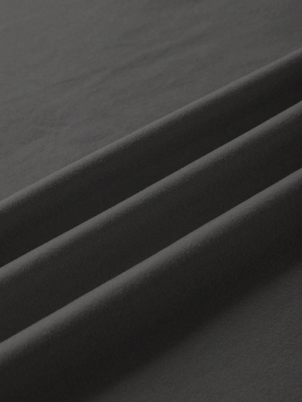A loose-fit cotton t-shirt with short sleeves and a round neck, shown in various colours.