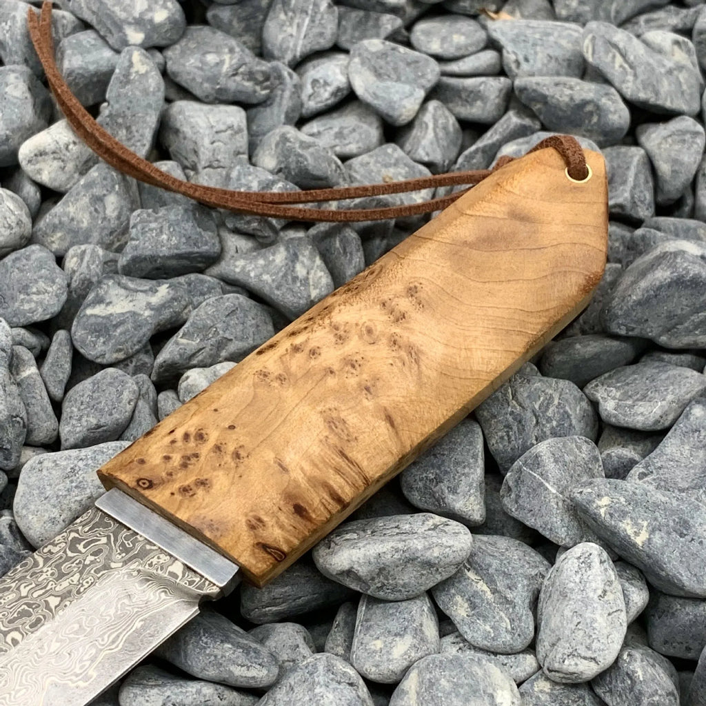 White Shadow Damascus pattern outdoor short knife with Thuja wood handle showing 18cm length