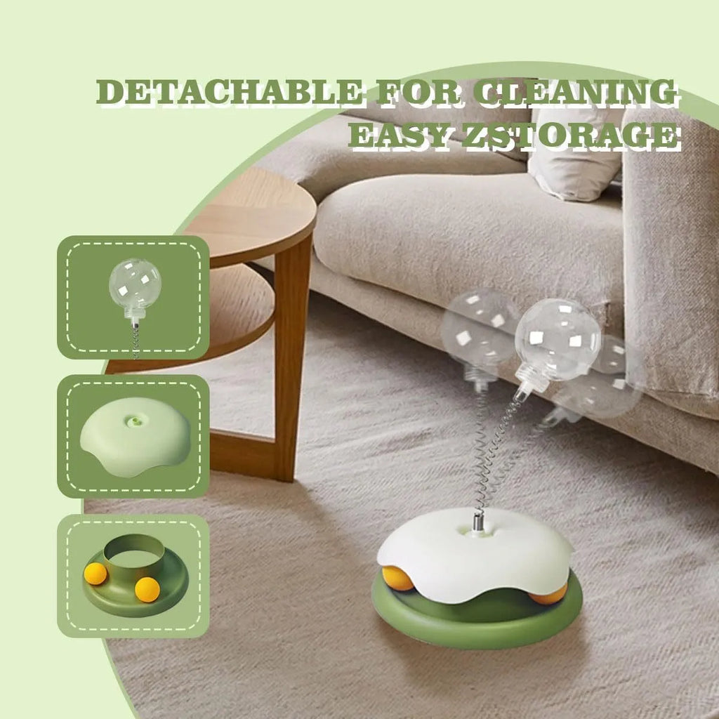 Blue and green cat treat dispenser toy with track ball, a slow feeder puzzle for indoor cats.