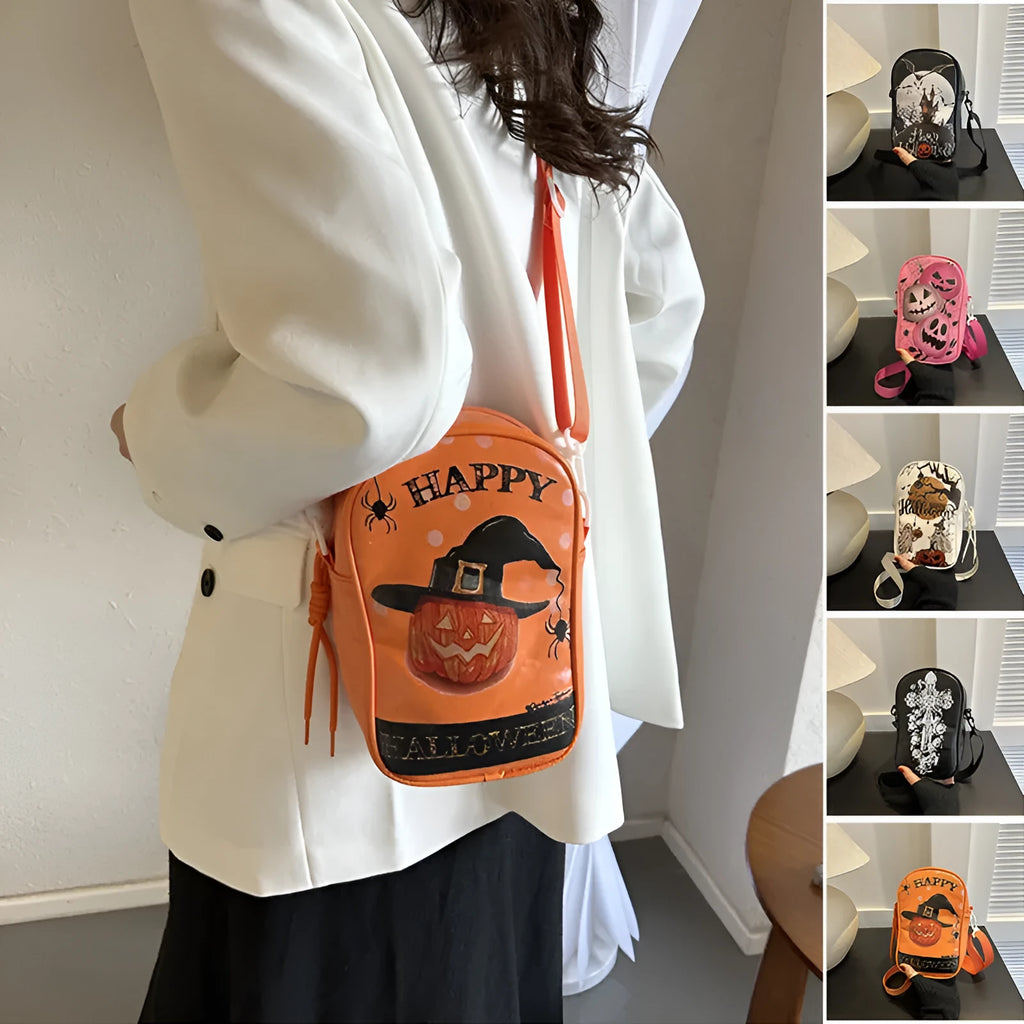 Black Halloween graffiti crossbody bag with cartoon pumpkin, ghost, and bat print, shown with adjustable strap.
