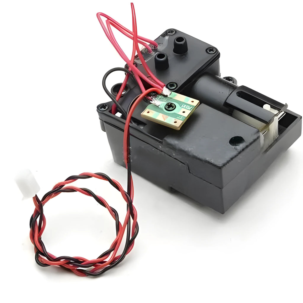 Black electronic smoke box accessory for 1/16 scale RC tank models on a grey surface.