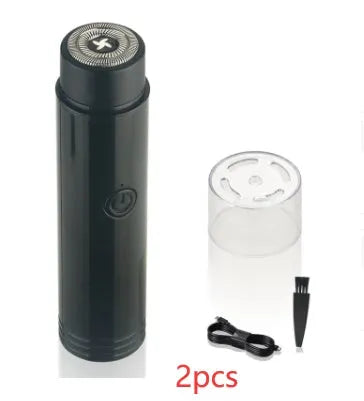 Compact portable electric shaver in black with USB charging cable.