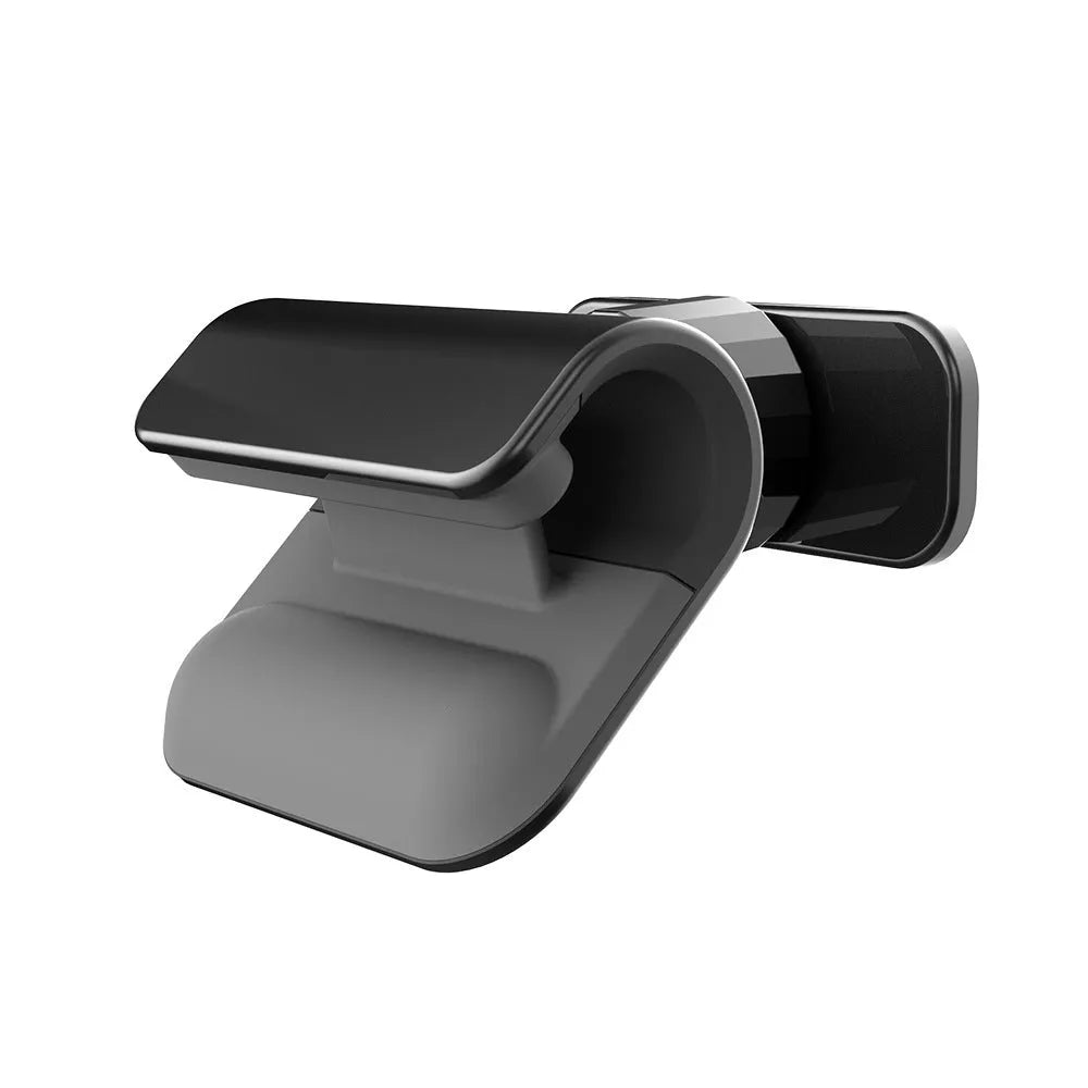 Black universal car phone holder mounted on dashboard with phone inserted showing 360-degree rotation