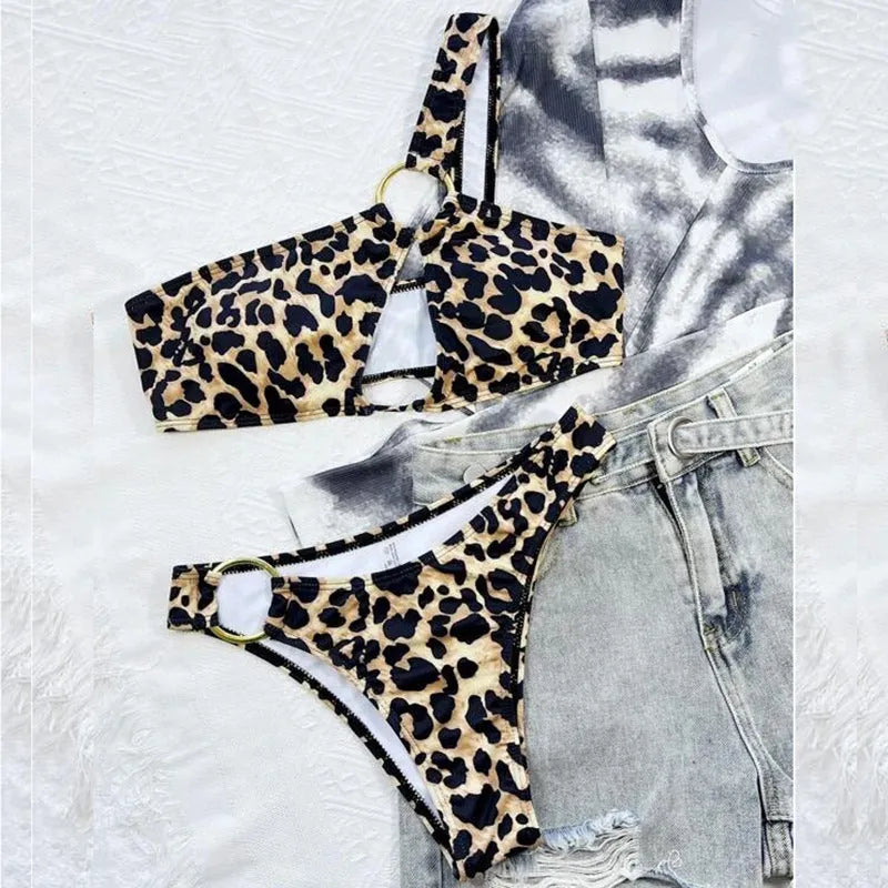 Women's leopard print bikini set with hollow polka dot pattern and nylon construction