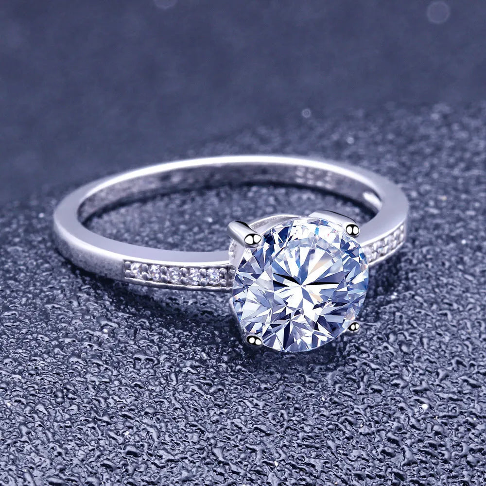 925 sterling silver engagement ring with 7.5mm main stone and small stones on white background