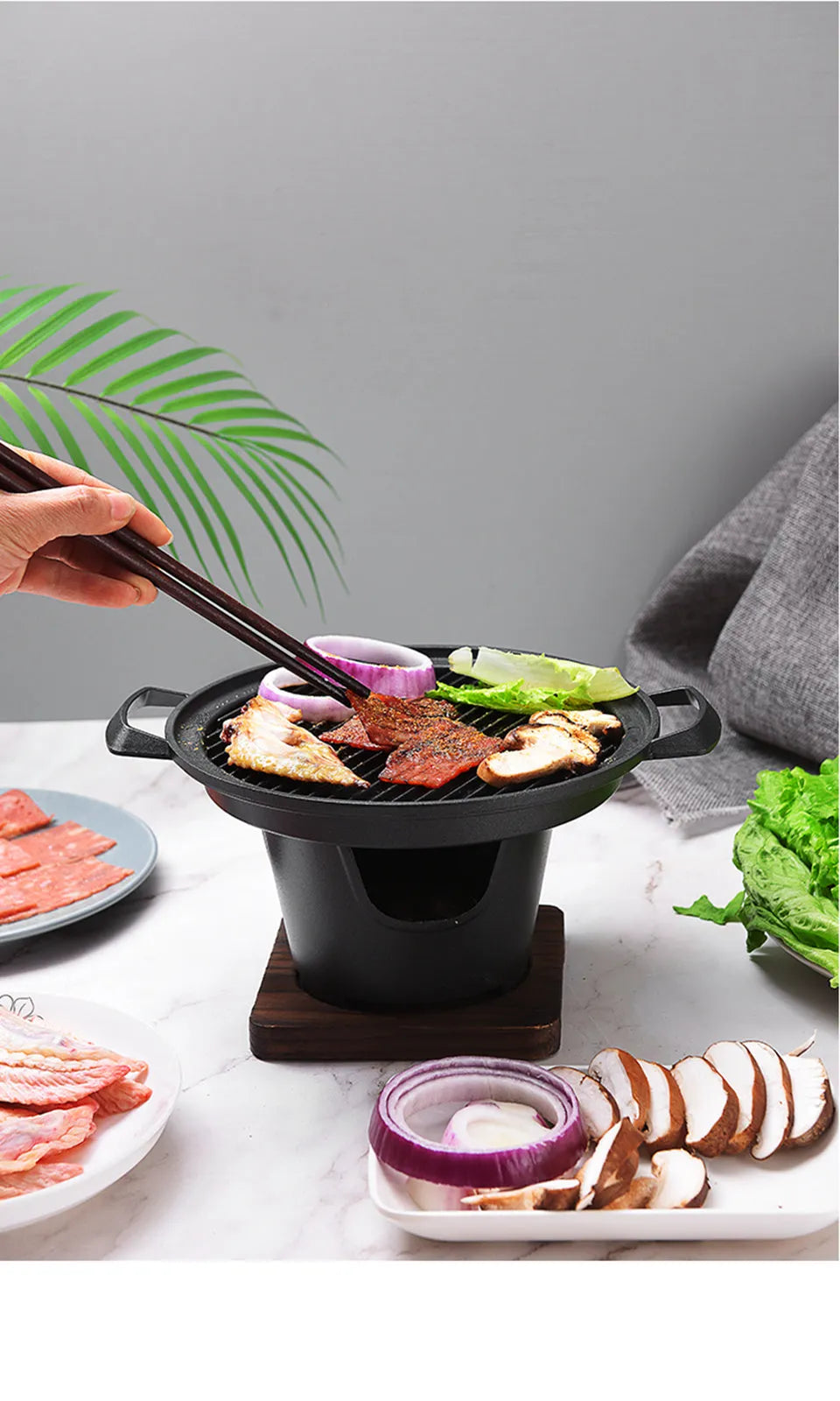 Mini BBQ grill alcohol stove double heads black 18x18x2cm on table with anti-stick plate