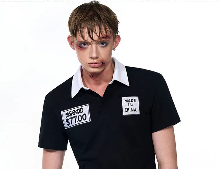 Black slim fit men's polo shirt with embroidery detail and short sleeves for summer wear