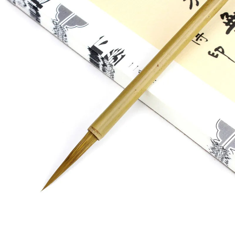 Traditional Chinese calligraphy writing brush with wolf hair bristles and wood handle in size S