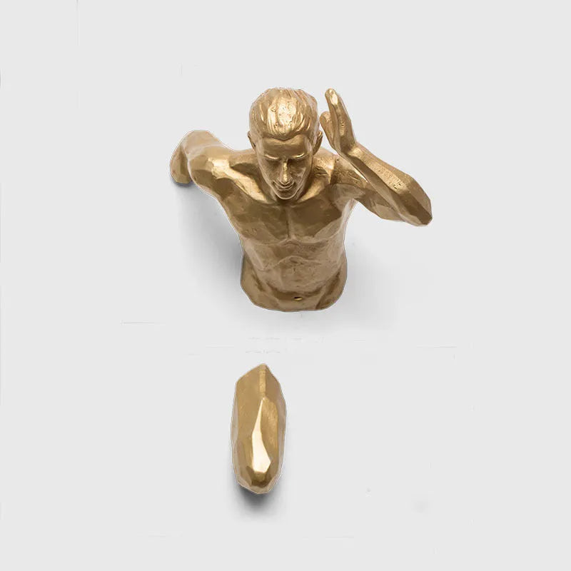 A modern, simple-style resin character sculpture for wall decoration, shown in a metallic finish.