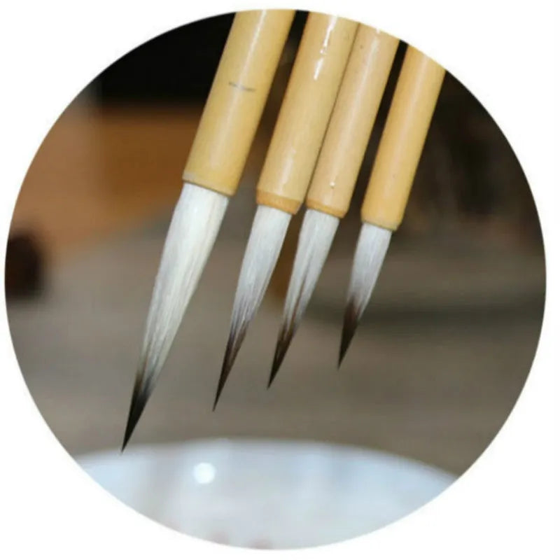 Traditional writing brush set with mixed hair construction and thin gold body design
