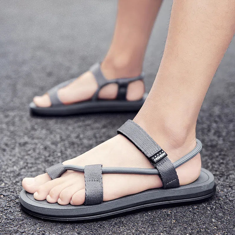 Men's breathable canvas open-toe beach slippers with Velcro strap in black, brown, and gray