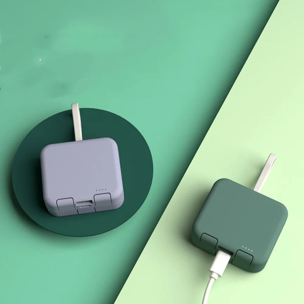 Handbag clip-on power bank in blue showing USB-A, Type-C and Lightning ports and built-in phone stand