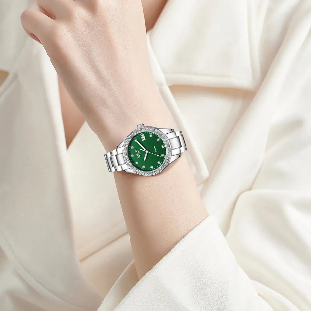 Silver fashion girl's watch with round diamond-encrusted bezel, luminous hands on a 34mm dial.
