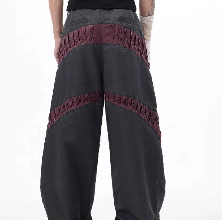 Grey straight leg casual rayon sports trousers laid flat.