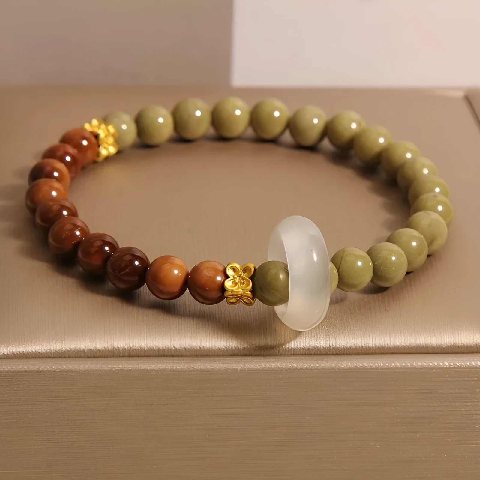 Green gradient women's bracelet with crown, diamond, and geometric shapes in a double ring new Chinese style design.