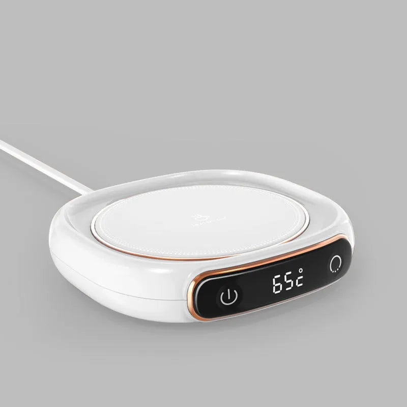 White USB coffee mug warmer plate on wooden desk with measurement showing 130x110mm dimensions