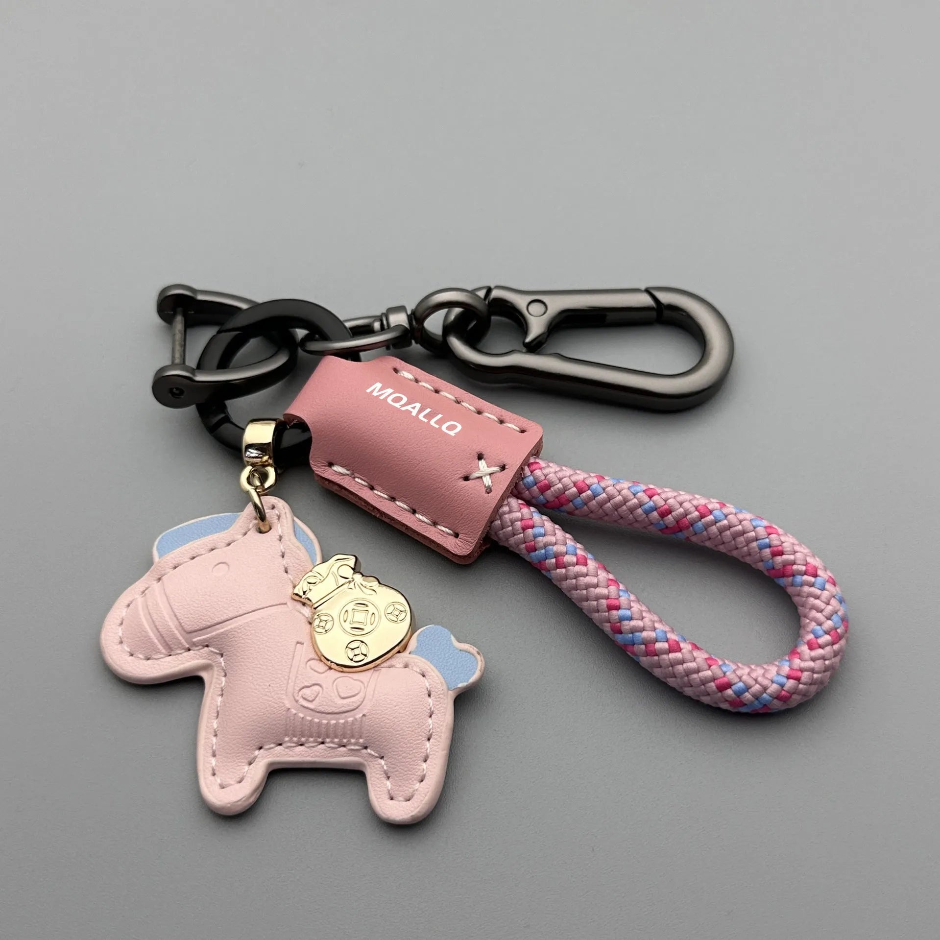 Handmade cowhide car key ring pendant with zinc alloy pony belt buckle on a colourful flanelle rope.