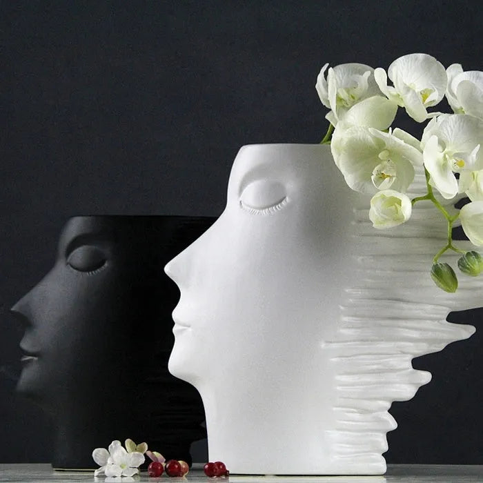 Nordic porcelain head ornament vase with matte finish, shown in black or white as a hanging decoration.