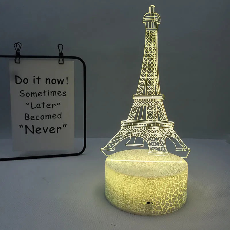 Eiffel Tower shaped 3D acrylic table lamp displaying seven colours, with touch controls and remote.