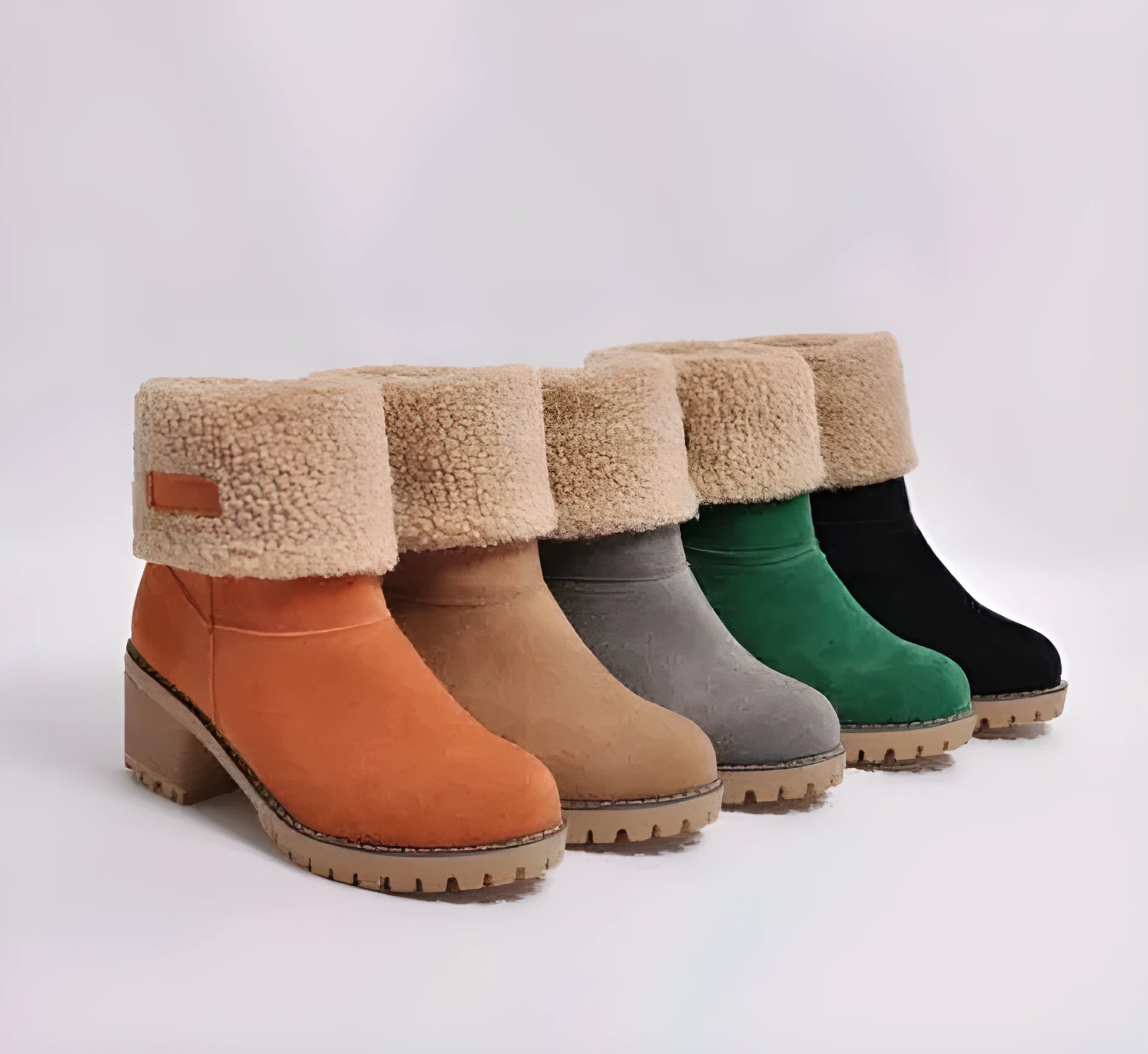 Women's chunky heel mid-calf suede snow boots in green, shown on a foot.