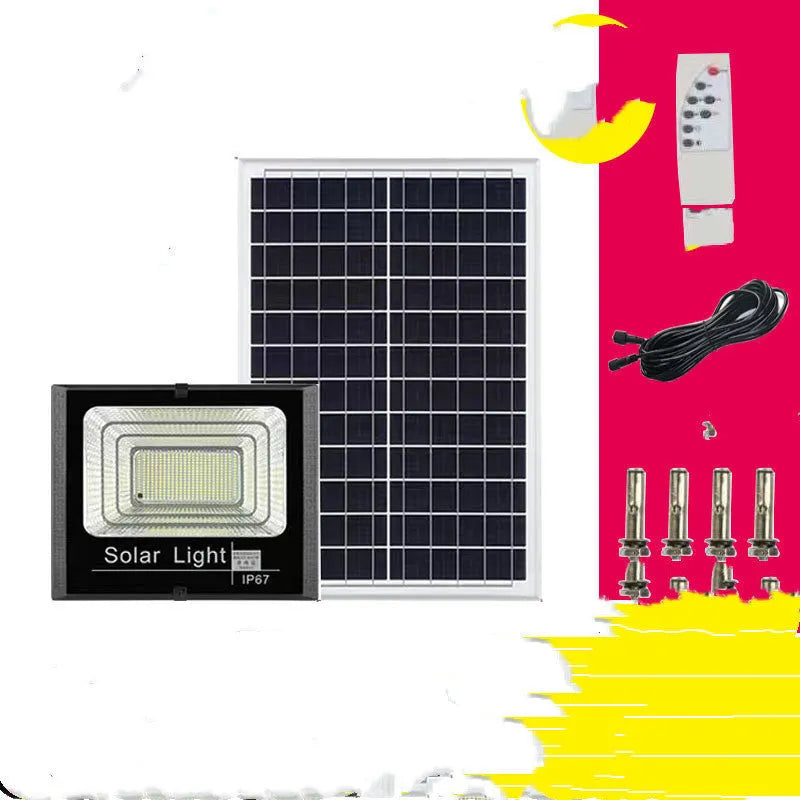 Black solar-powered LED flood light with motion sensor mounted on a wall bracket in a garden setting.