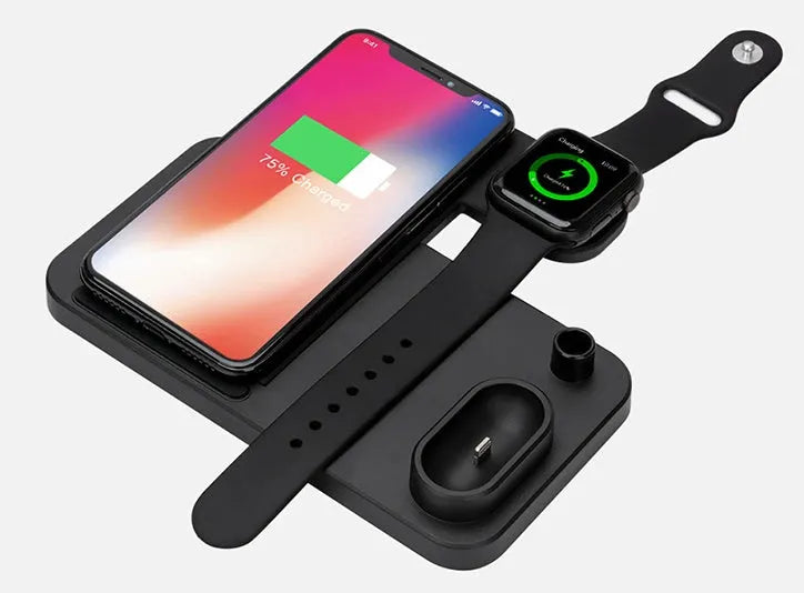Black 4-in-1 wireless charging dock showing phone on angled stand, Apple Watch, AirPods case, and Apple Pencil charging simultaneously.