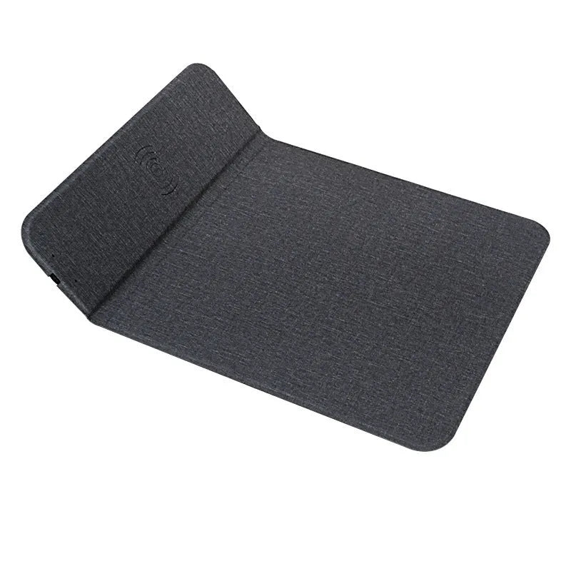 Foldable fabric wireless charging phone holder propping up a smartphone.