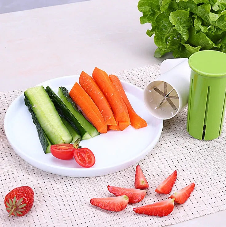 White vegetable cutter tool with six stainless steel blades for slicing cucumbers and carrots