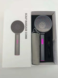 Electric scalp comb with red light and massage function in gray colour for home hair care use