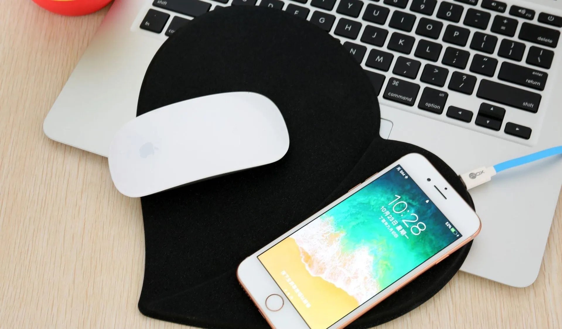 Heart shaped leather wireless charging mouse pad in black with USB cable