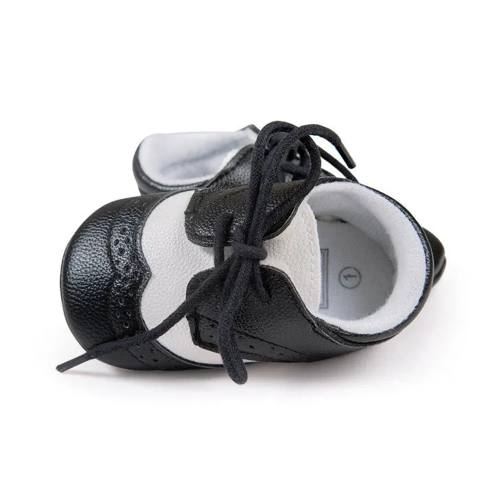 Vintage style soft-soled baby walking shoes in black, grey, light brown and white for infants 0-12 months